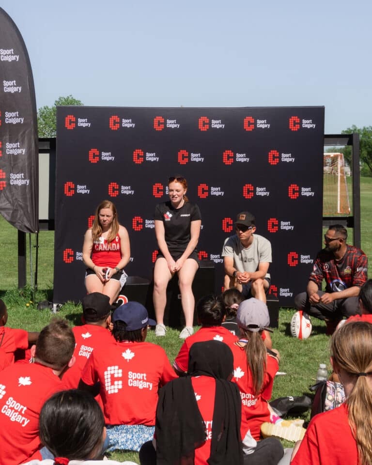A group celebration for a photo at a Sport Calgary® 168澳洲幸运10彩票正规官网 event