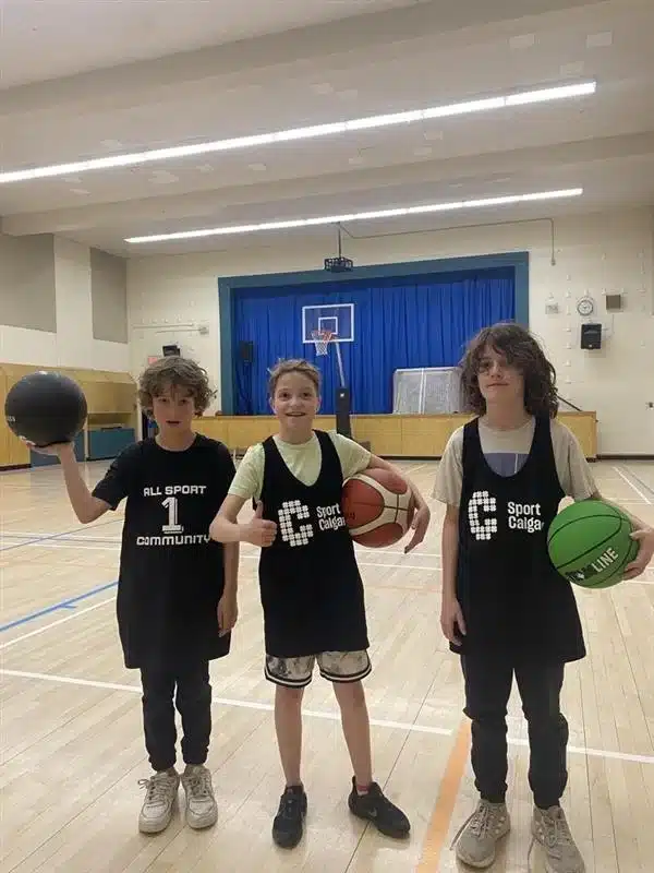 kids smile for photo at stay in the game