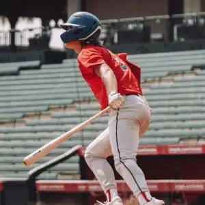 Player runs to a base in a Calgary baseball diamond